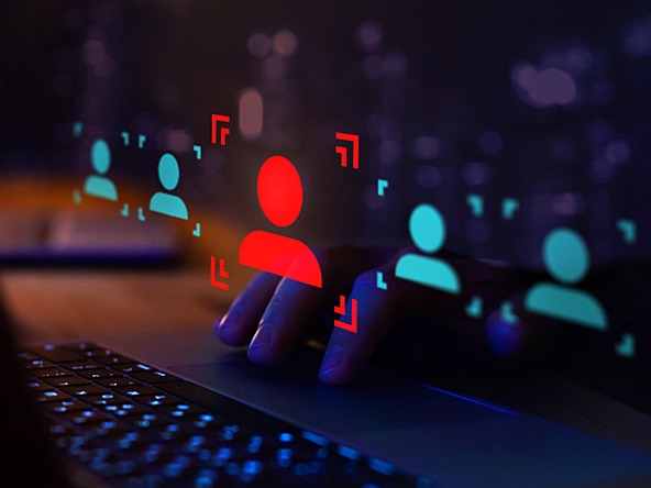 keyboard with red individual floating above next to blue ones with dark background